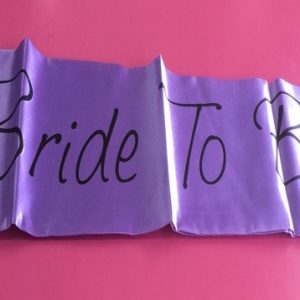 We Like To Party Bride To Be Purple Sash With Black Writing